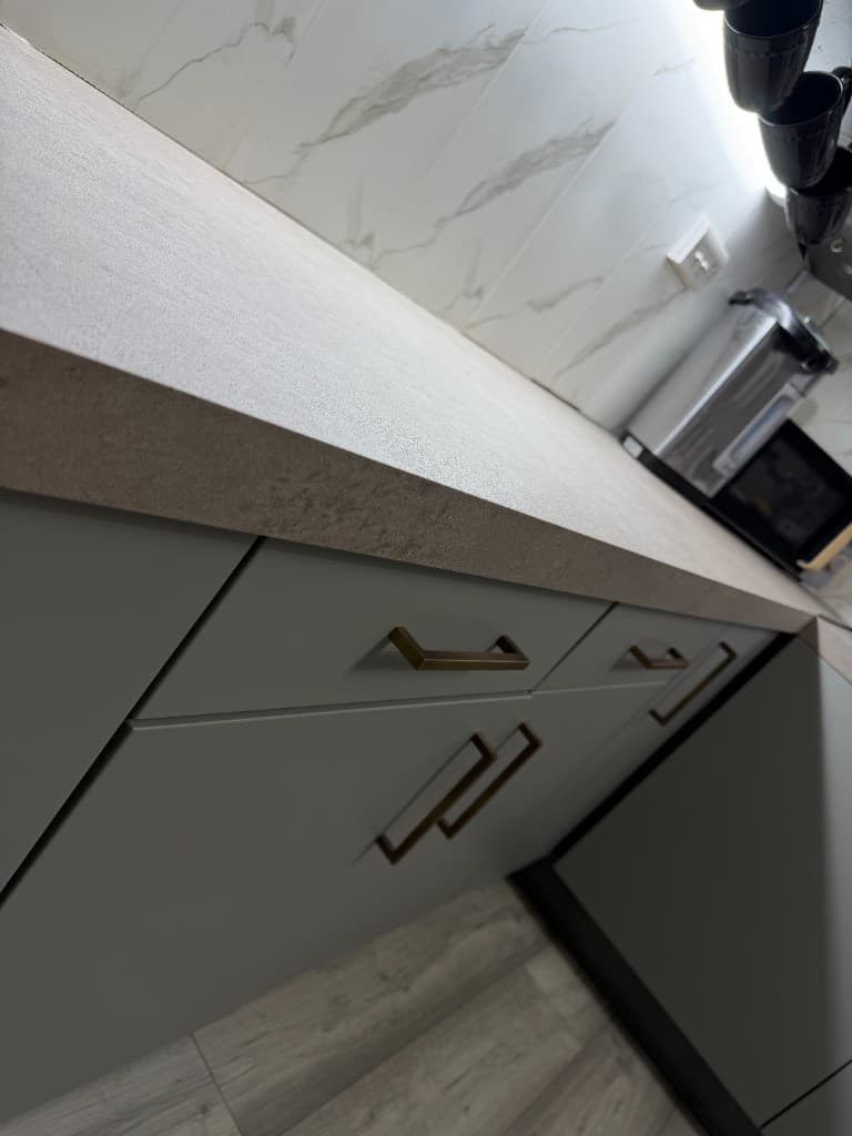 Grey kitchen wrap Rotherham close-up, wrapped cabinet doors and worktop