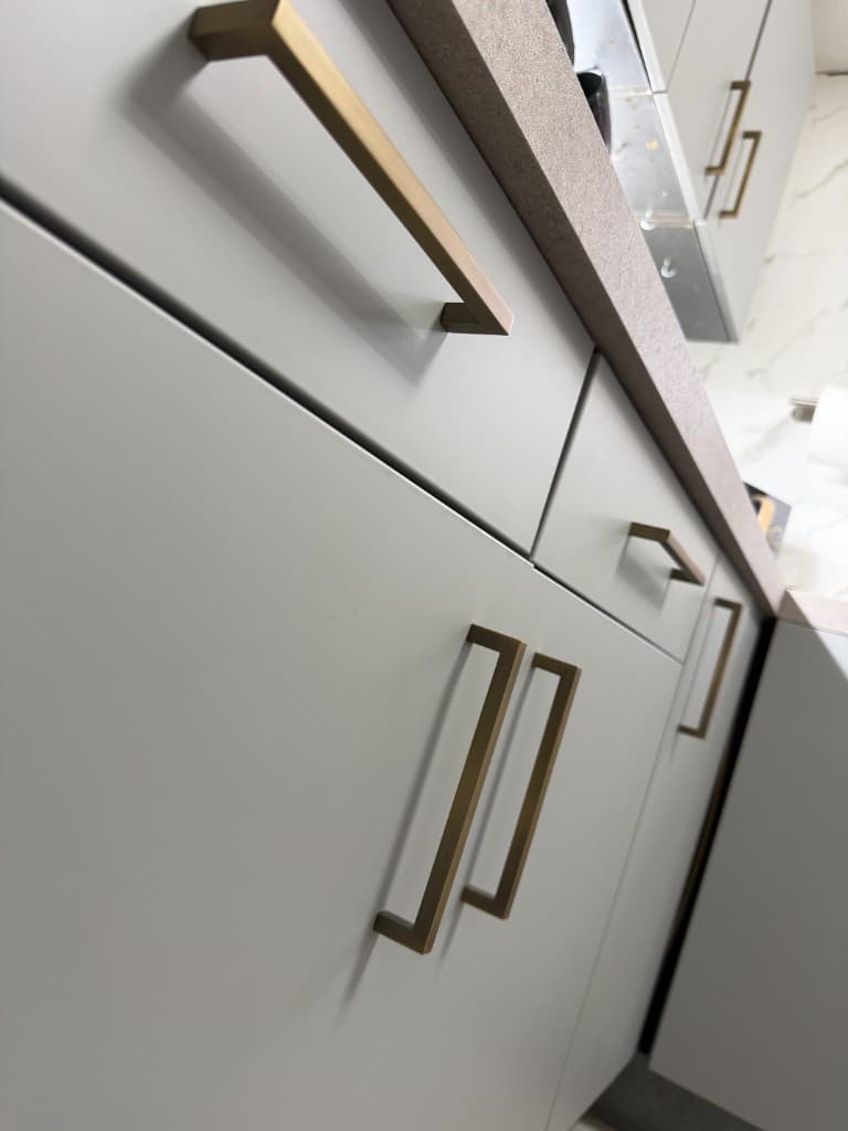 Grey vinyl kitchen wrap in Rotherham, wrapped cabinet front detail
