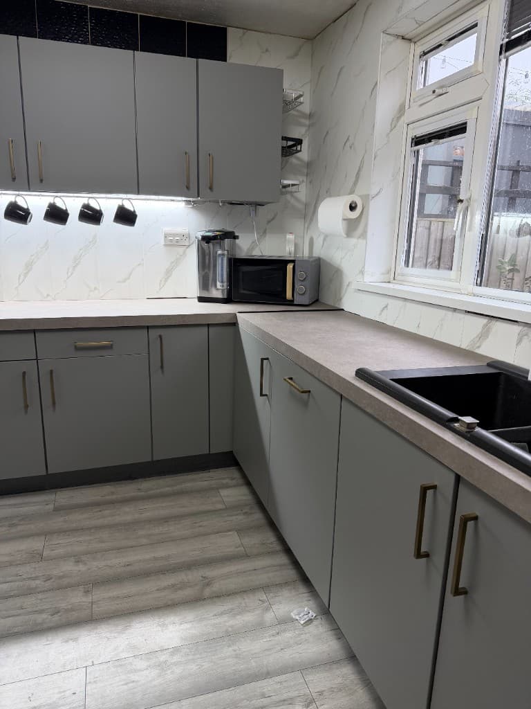 Completed grey kitchen wrapping project in Rotherham, full fitted view