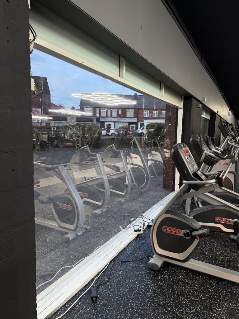 Mirror window film Rotherham — reflective gym window street view