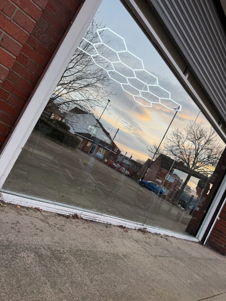 Mirror window film Rotherham — reflective commercial window exterior