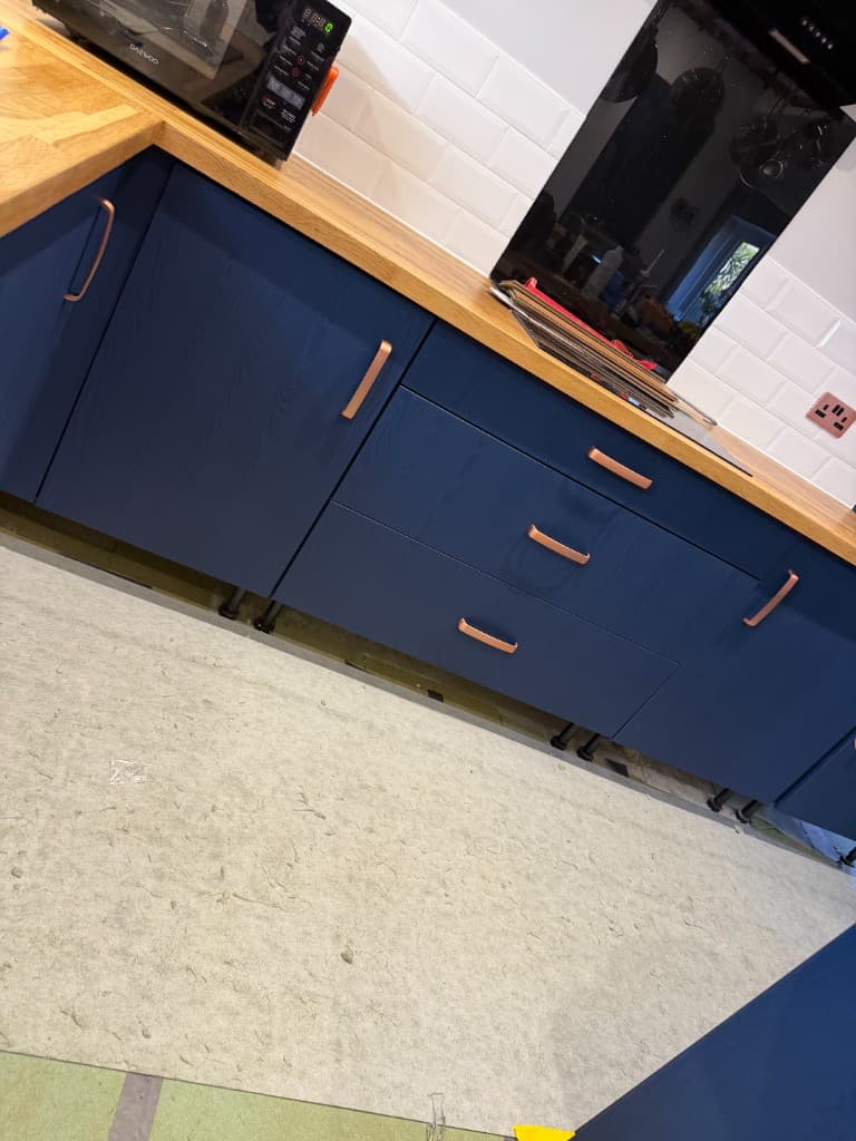 Kitchen transformation with refreshed wrapped doors and drawers
