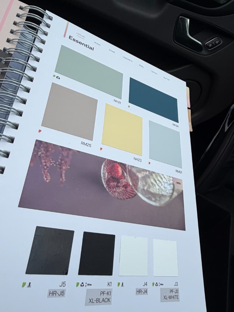 Kitchen vinyl sample book pages with colour and texture finish choices