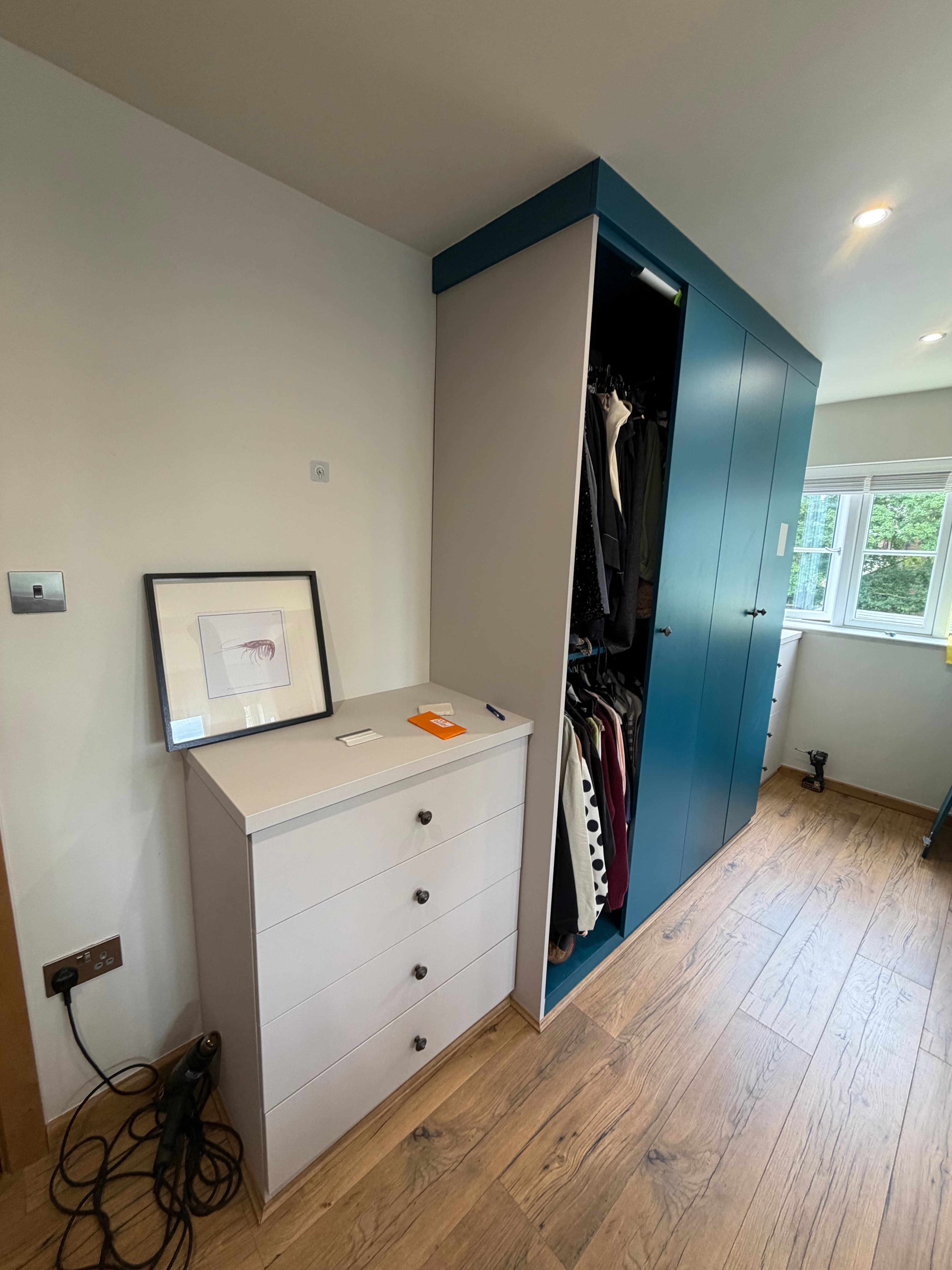 Built-in wardrobe Chesterfield — bedroom furniture installation in progress