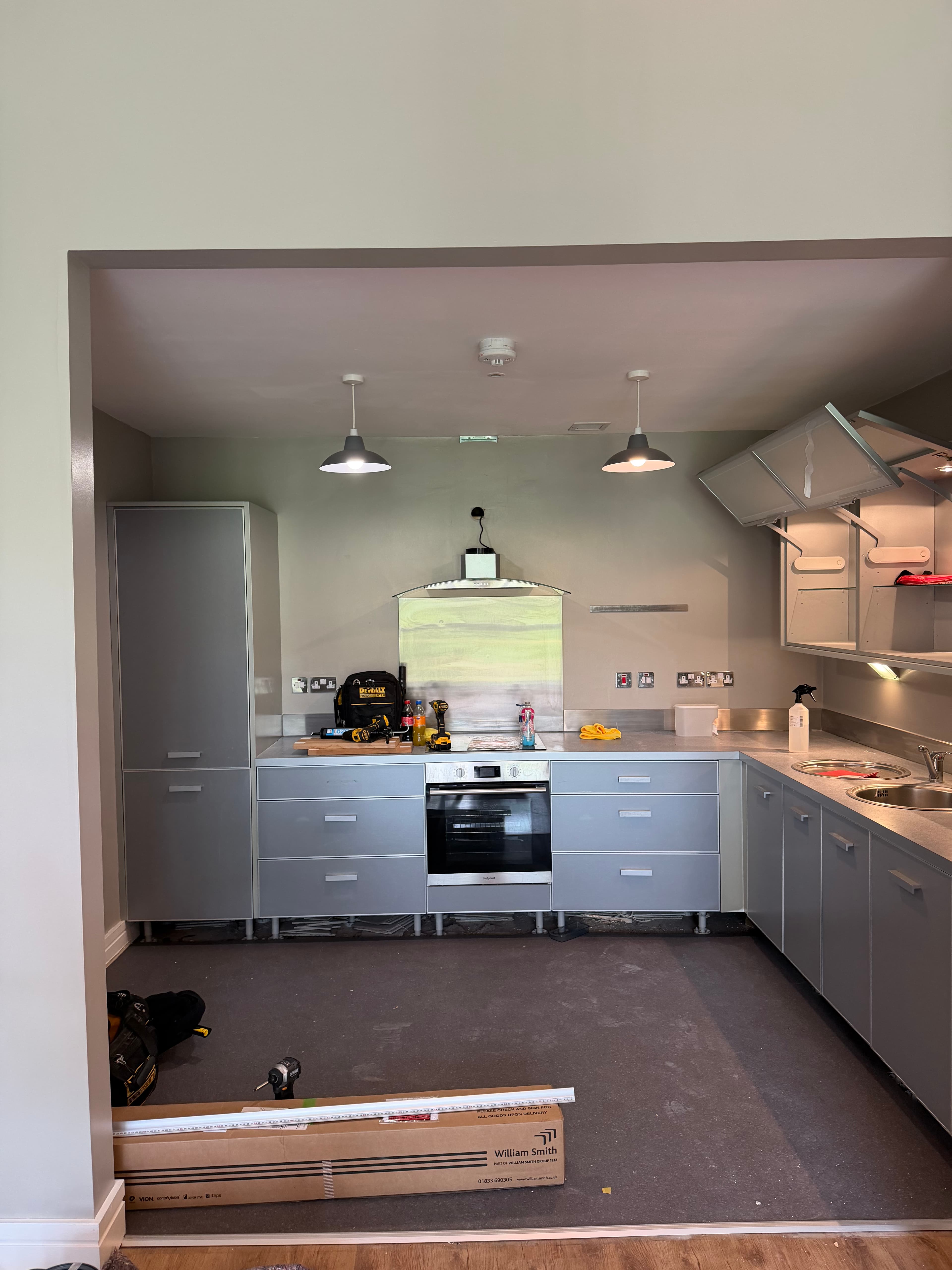 Kitchen wrap Titanic Spa Huddersfield — commercial kitchen during installation