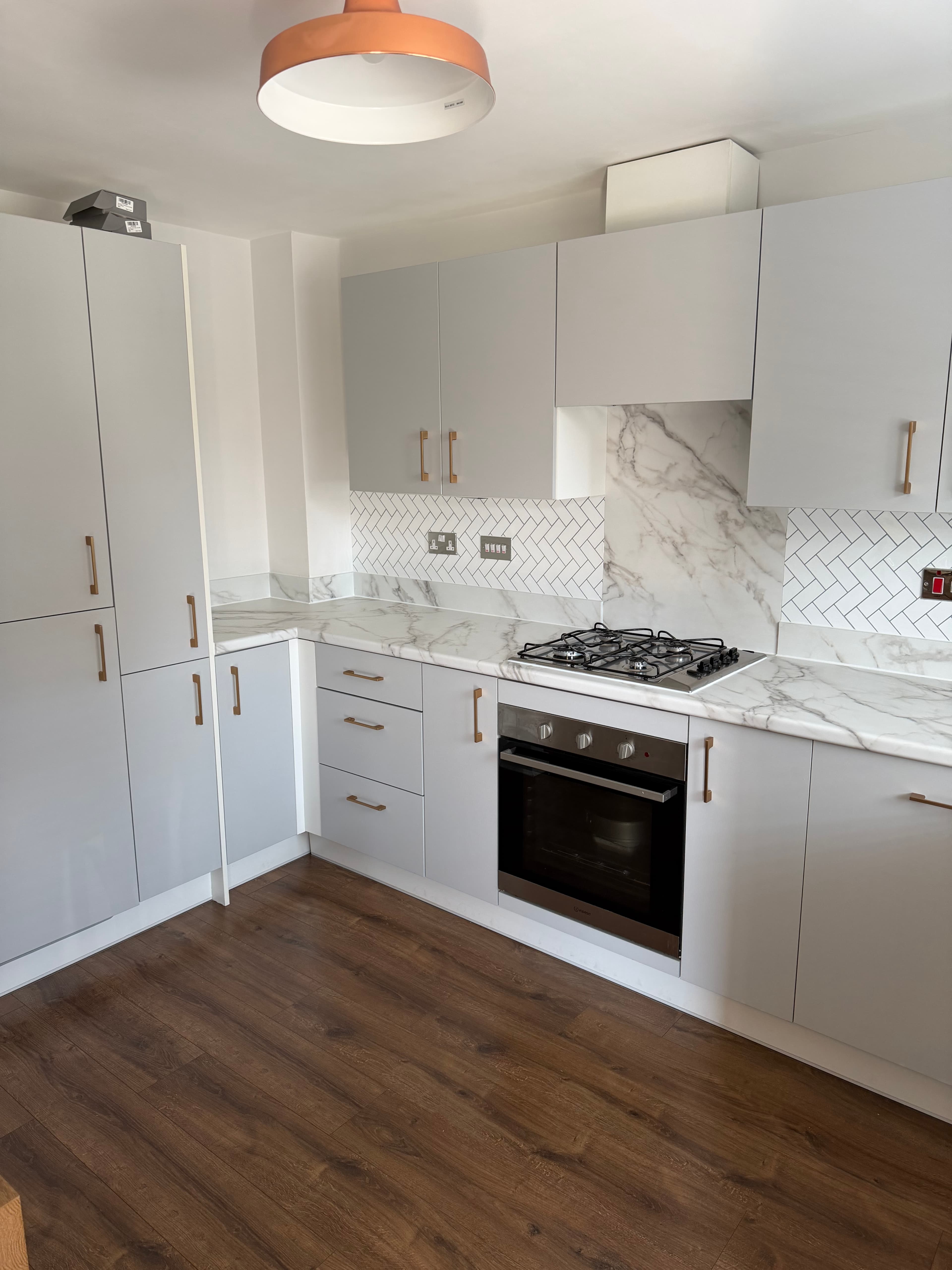 Kitchen wrap Titanic Spa Huddersfield — modern grey kitchen after