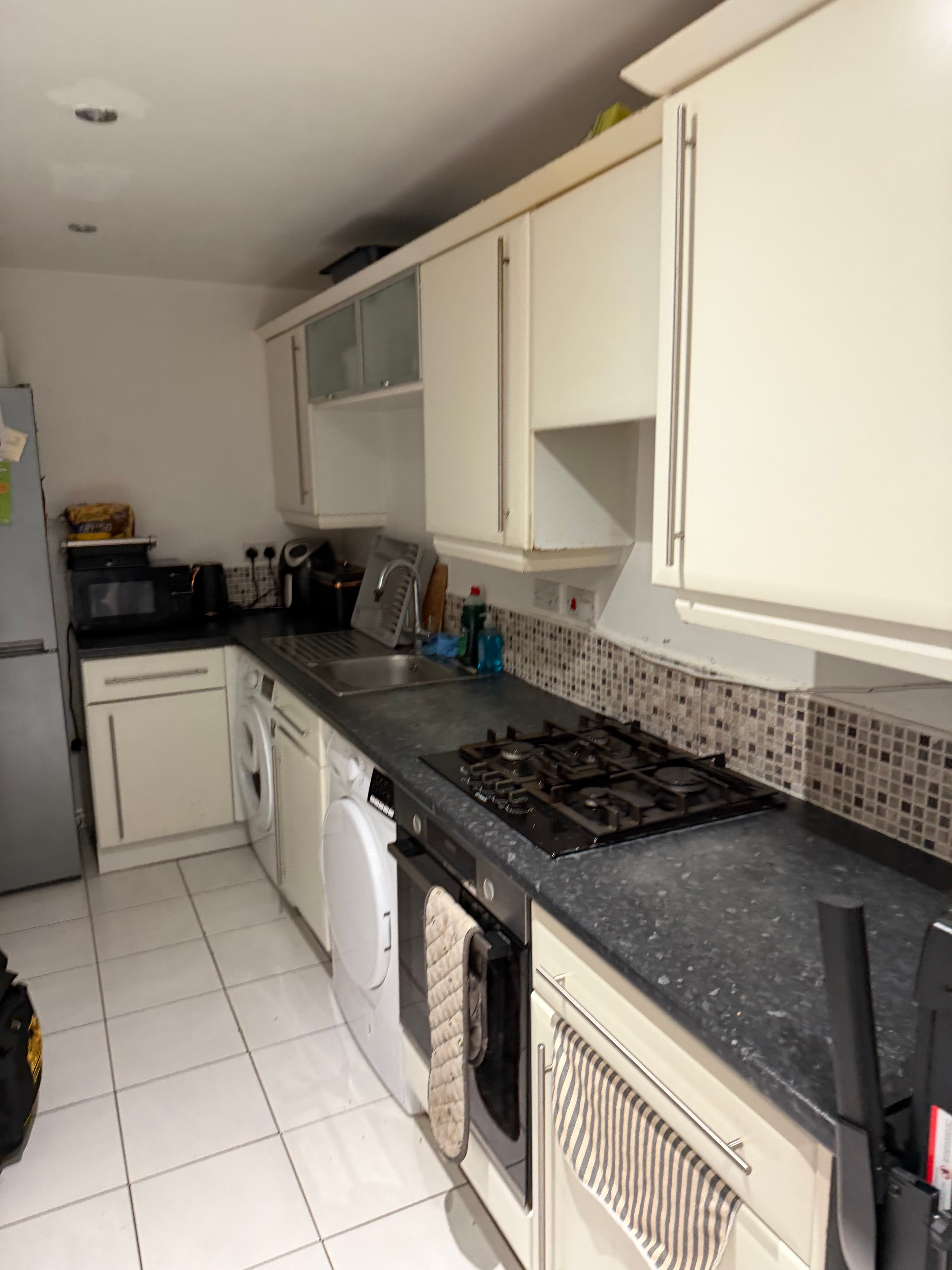 Black kitchen wrap Sheffield — cream kitchen before transformation