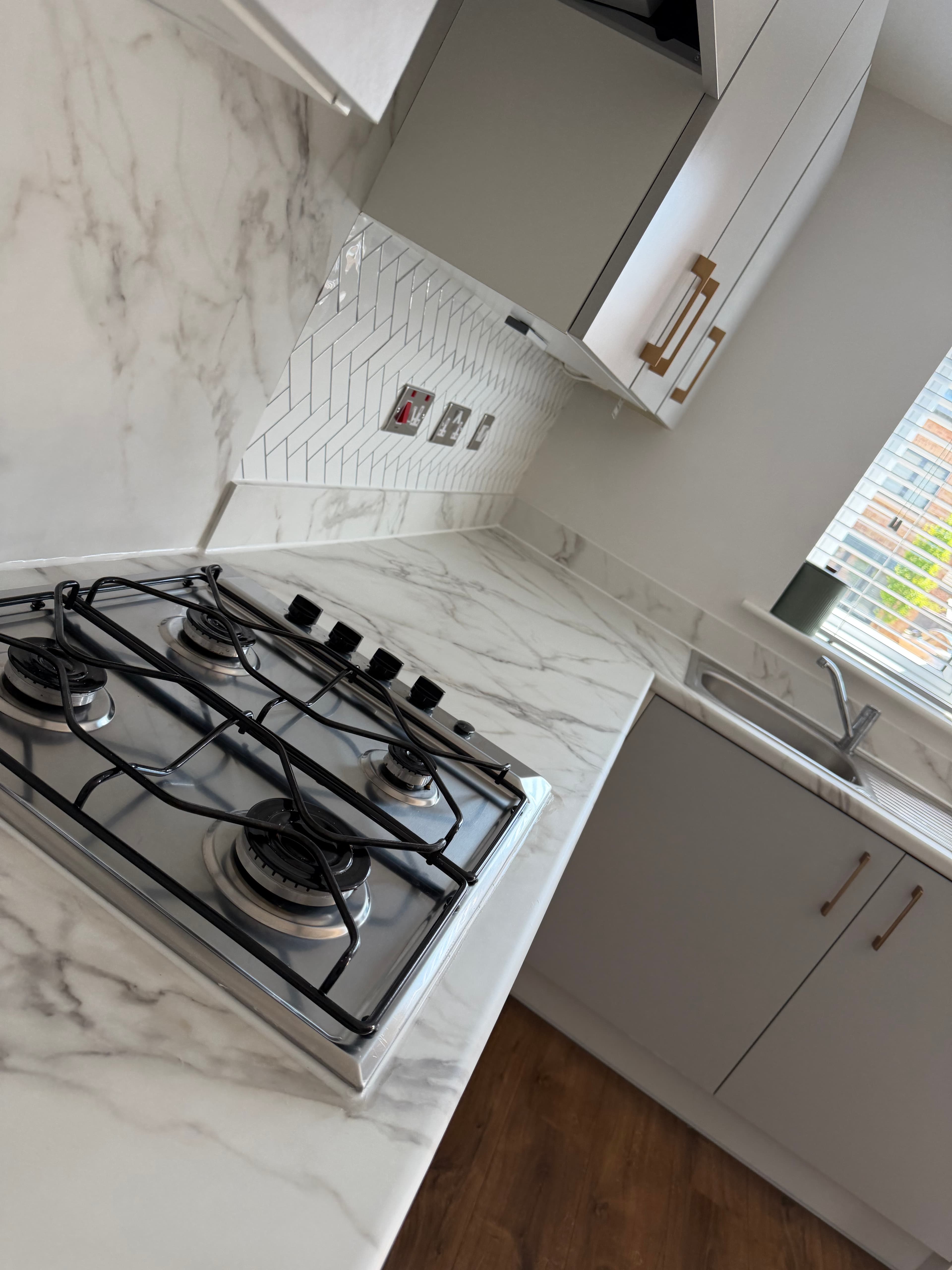 Marble worktop wrap Pontefract — sink run with marble worktop after