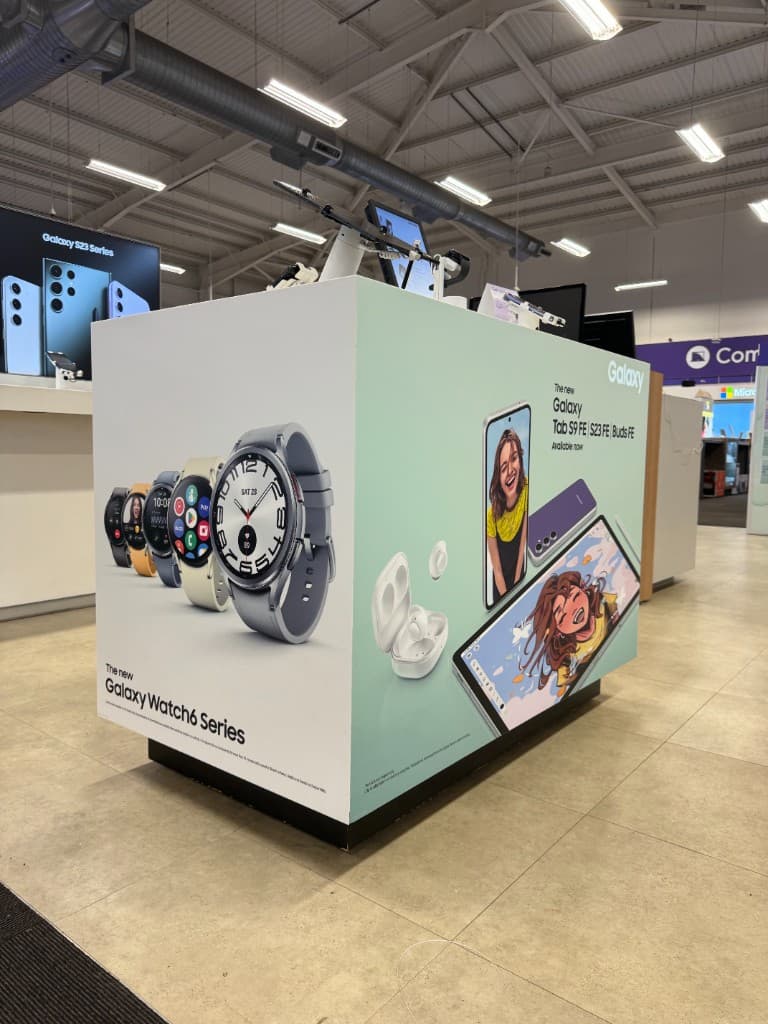 Large format food photography graphics applied to a storefront.